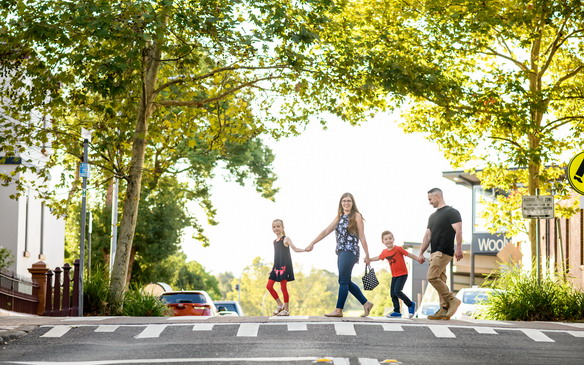 Family crossing road