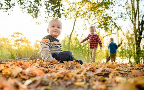 Kid in leaves